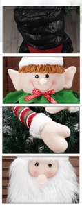Detail of plush Christmas elf and Santa decorations showing knit texture and faux fur