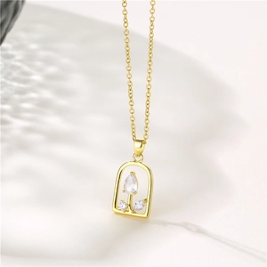 Minimalist gold necklace with 3D rose pendant featuring clear faceted gemstones