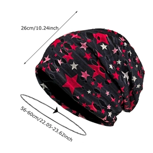 Black knitted slouchy beanie with star pattern and distressed hollow details for winter