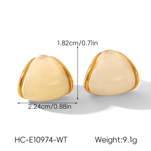 Detail showing dimensions of beige triangle stud earrings in 18k gold plated steel