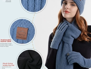 Detail of grey-blue knit hat set featuring soft fleece lining and a leather sport label