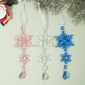 Detail of pink blue and clear acrylic snowflake ornaments with water drop pendants
