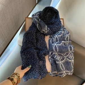 Navy blue cotton linen scarf with white polka dots and geometric patterns and tassels