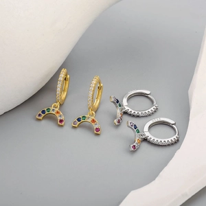 Detailed macro view of S925 sterling silver moon earrings with colorful zircon inlay