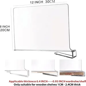 Clear acrylic closet shelf divider for organizing bags and books on a white background