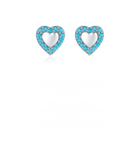 Macro shot of S925 sterling silver heart studs with turquoise inlay and mirror finish