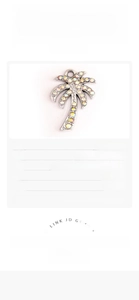 Detailed view of coconut tree rhinestone charm with dimensions 2.5cm by 1.7cm for DIY jewelry