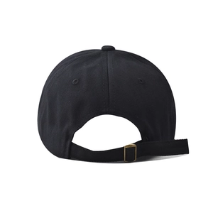 Detail view of the black cotton baseball cap showing adjustable metal strap and buckle