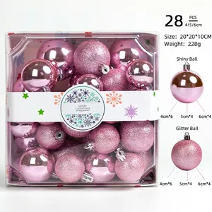 Detail of 28pcs pink Christmas ball ornaments set showing glossy and glitter finishes