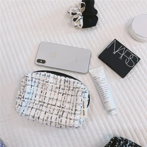 Tweed cosmetic bag with zipper shown with iPhone and makeup for size reference
