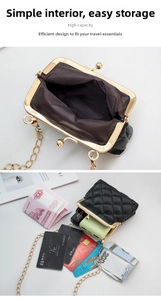 Detail of black quilted mini bag showing interior capacity for phone and makeup