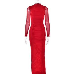 Detail view of red bodycon dress with mesh patchwork sleeves and ruched design accents