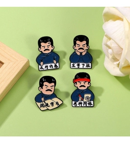 Enamel cartoon Lu Xun lapel pins set on green background with decorative props