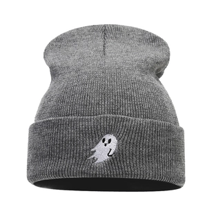 Dark grey knitted beanie featuring a minimalist white ghost embroidery on the folded cuff