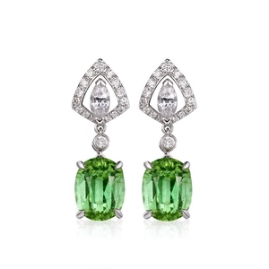 Elegant silver earrings with oval green tourmaline zircons and sparkling diamond accents