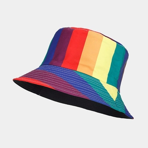 Detail of the high-quality stitching and vibrant rainbow stripe texture on the bucket hat