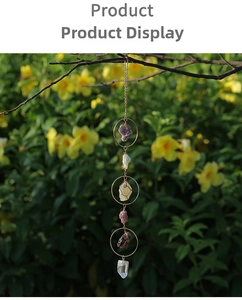 Detail of cascaded natural raw crystal stones in rose gold rings for garden hanging