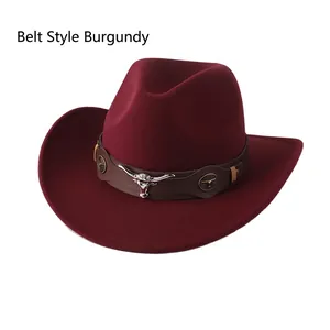 Detail of burgundy wool felt western hat featuring leather band and silver bull head emblem
