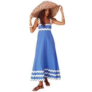 Elegant bright blue maxi slip dress with white wavy trim details and a high waist silhouette
