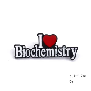 Detail of I Love Biochemistry black enamel brooch showing 4.4x1.7cm size dimensions