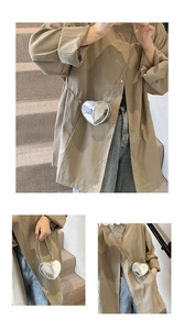 Detailed views of a silver heart-shaped mini bag with chain strap and Forever Love text