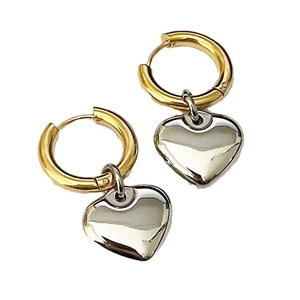 Boucles d'oreilles créoles coeur bicolores avec finitions polies or et argent