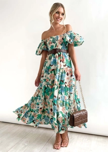 Detail of off-shoulder floral maxi dress with puff sleeves and wide brown leather belt