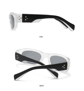 Detail showing retro square sunglasses with black frames and star shaped metal rivets