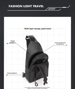 Detailed view of black cross body chest bag showing multi-layered storage compartments