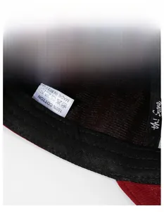 Macro detail of 100% cotton washed baseball cap featuring reinforced sweatband and embroidery