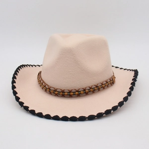 Close-up of ethnic style fedora hat with turquoise beads and black stitched brim