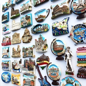 Assorted colorful resin Italy travel souvenir magnets featuring Rome and Tuscany landmarks