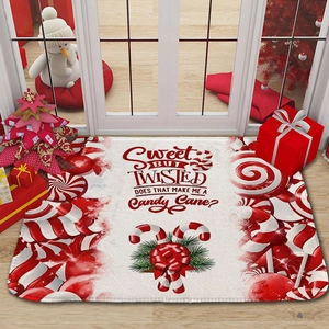 Detail of Christmas flannel door mat with candy cane stripes and festive typography