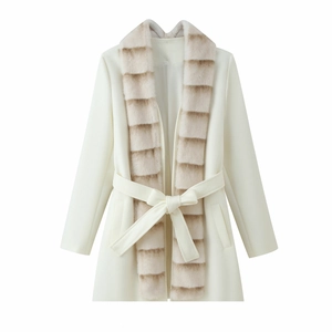 Elegant white wool coat with faux fur collar and belted waist for a stylish winter look