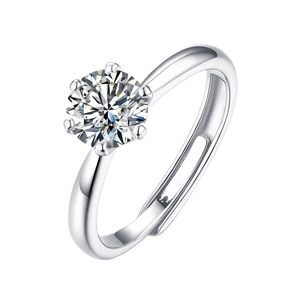 Macro shot of silver ring with six-prong set brilliant-cut cubic zirconia stone