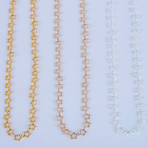 Detail showing 5mm hollow star chain links in gold, rose gold, and silver finishes