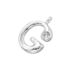 Detail of silver letter G pendant with inlaid round crystal on white background