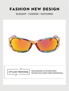 Detail of butterfly sunglasses with diamond cut lenses and engraved metal trim