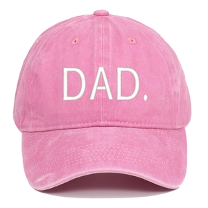 Detailed embroidery of DAD text on vintage pink washed cotton baseball cap texture