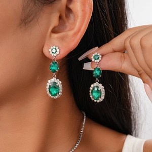 Vintage emerald style silver dangle earrings with green artificial gemstones