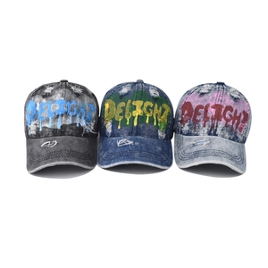 Washed denim baseball caps with graffiti delight print and distressed details