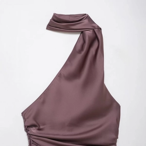 Elegant mauve satin halter top featuring chic side rushing and smooth silk texture