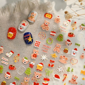3D embossed Christmas nail art stickers featuring cartoon bears and festive holiday motifs