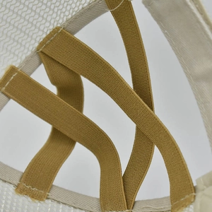 Close-up of ponytail baseball cap back with elastic criss-cross bands and breathable mesh