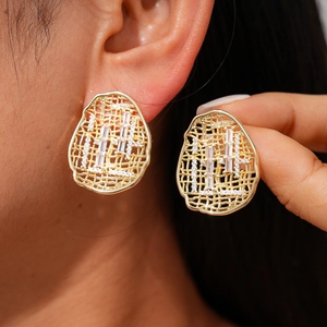Elegant 18k gold plated hollow oval stud earrings with rectangular zircon on female ear
