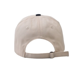 Adjustable back view of beige cotton baseball cap with silver metal buckle and strap
