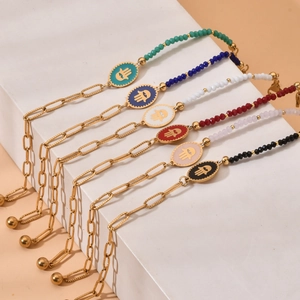 Bohemian evil eye paperclip bracelets with colorful beads and Hamsa hand charm
