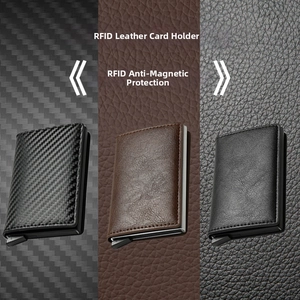 Detail view of three RFID blocking wallets in carbon fiber and lychee leather textures