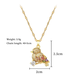 Detail of colorful zircon bird pendant on gold lip chain with weight and size specs