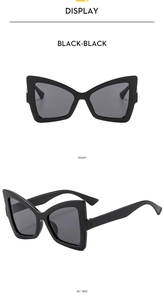 Front and 45-degree angle views of elegant black butterfly frame oversized sunglasses